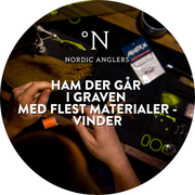 Ham der går i graven med flest materialer - Vinder - Sticker