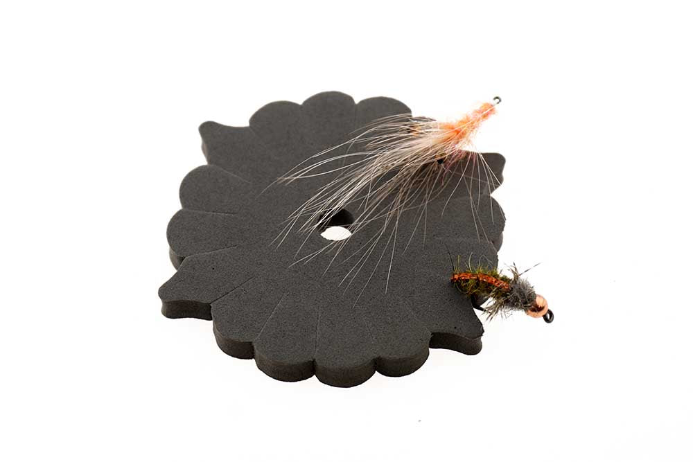 Flueholder til stikket