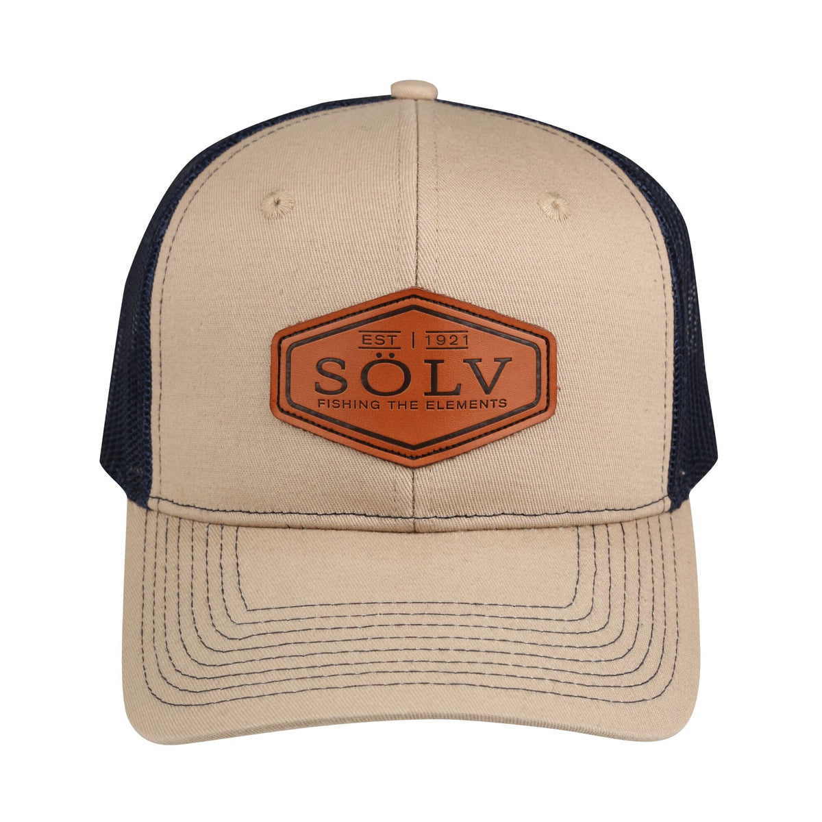 Abu Garcia Sölv Trucker Cap with a beige front and peak, navy blue mesh and a leather patch featuring the Sölv logo.